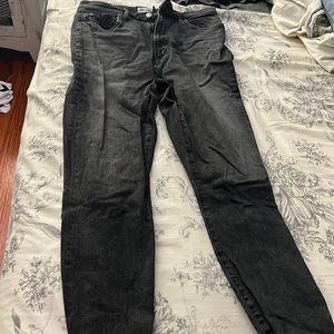Agolde high waisted black jeans with more of a tapered leg. Worn once or twice
